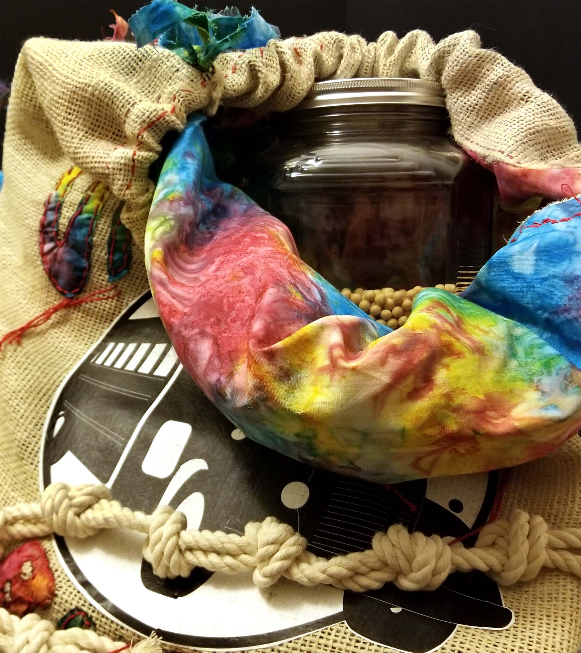 On the Bus Bulk, Loyalty Shopper large burlap tote/sack, interior view displaying the rainbow tiedye like lining