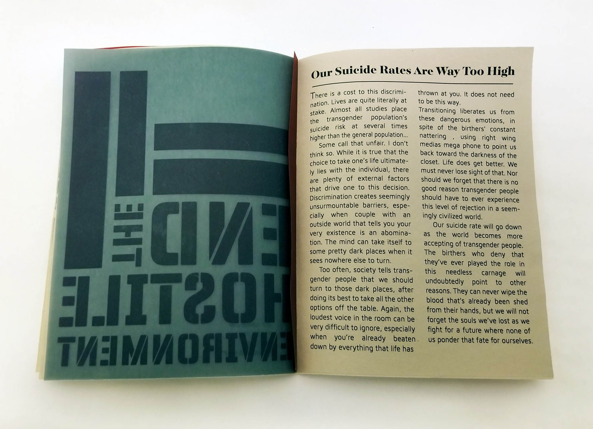 TRANSpaper sample spread showing a two column layout and a headline that reads “Our Suicide Rates Are Way Too High”